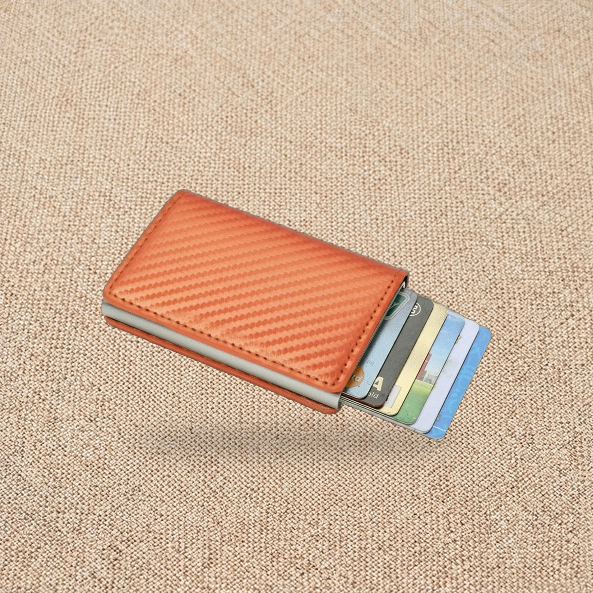 Porte-cartes RFID effet carbone, éjection en éventail — Le Carbone, coloris Orange