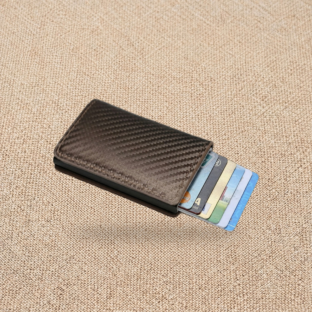 Porte-cartes RFID effet carbone, éjection en éventail — Le Carbone, coloris Bronze